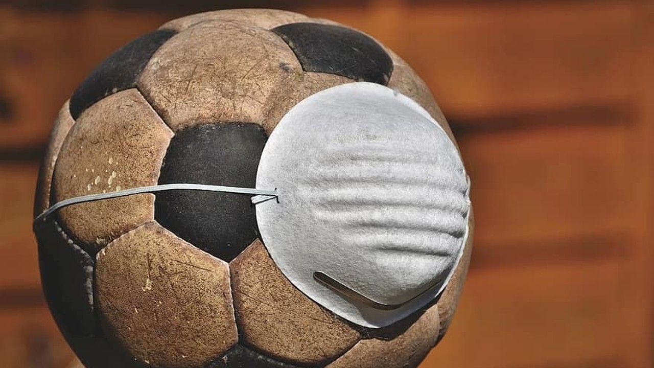 soccer ball with covid mask