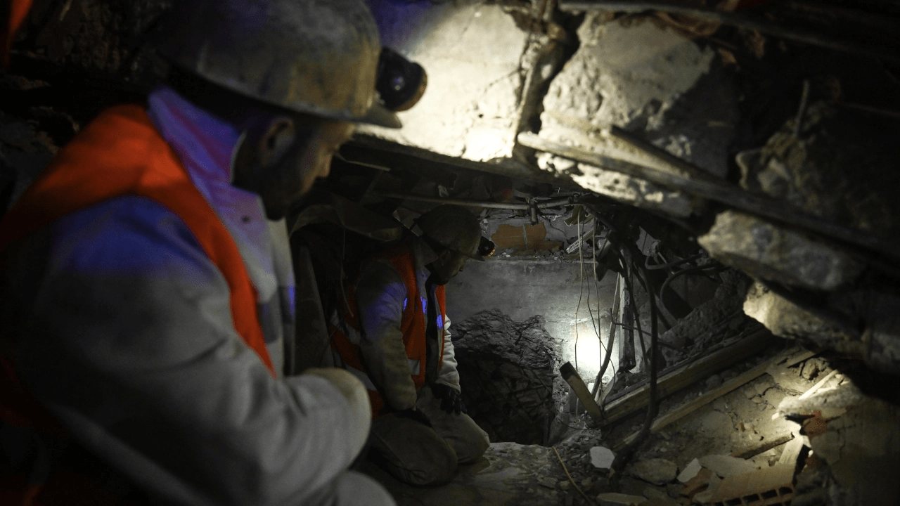 Miners working on the wreck