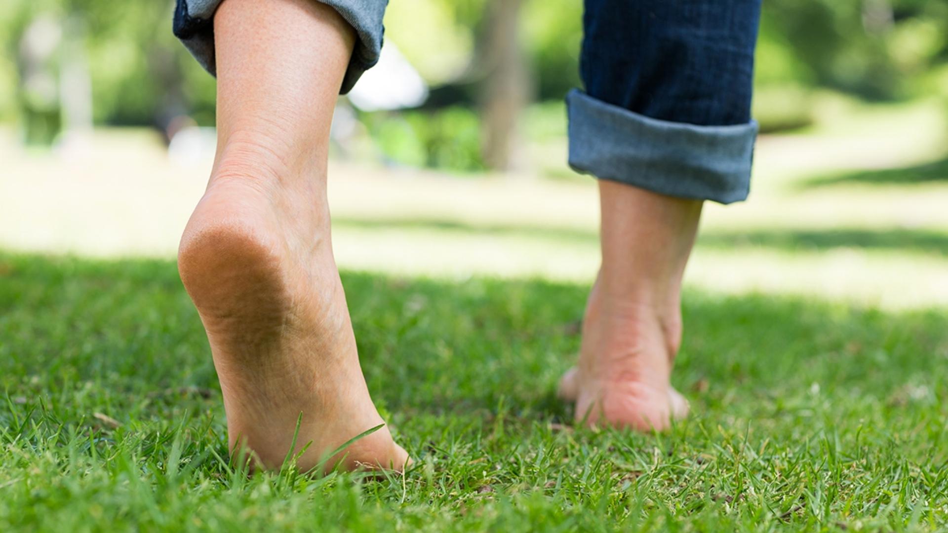 Walking barefoot on the ground, grounding