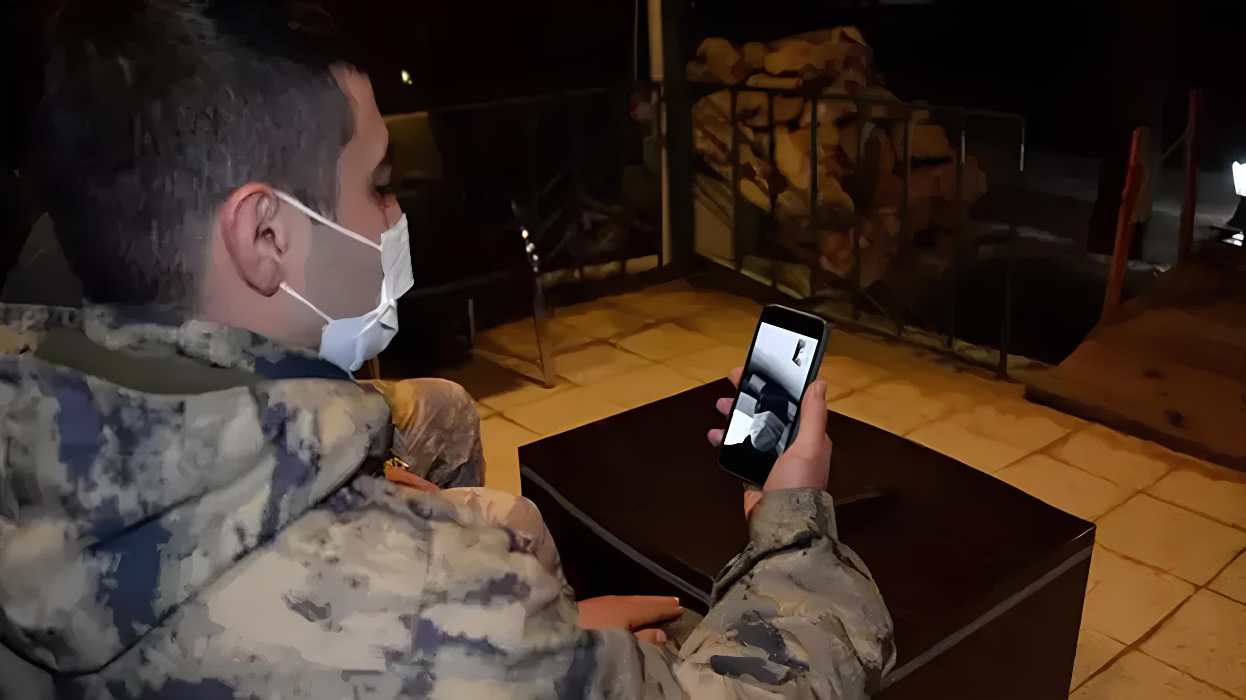 Soldier Talking via Video Phone