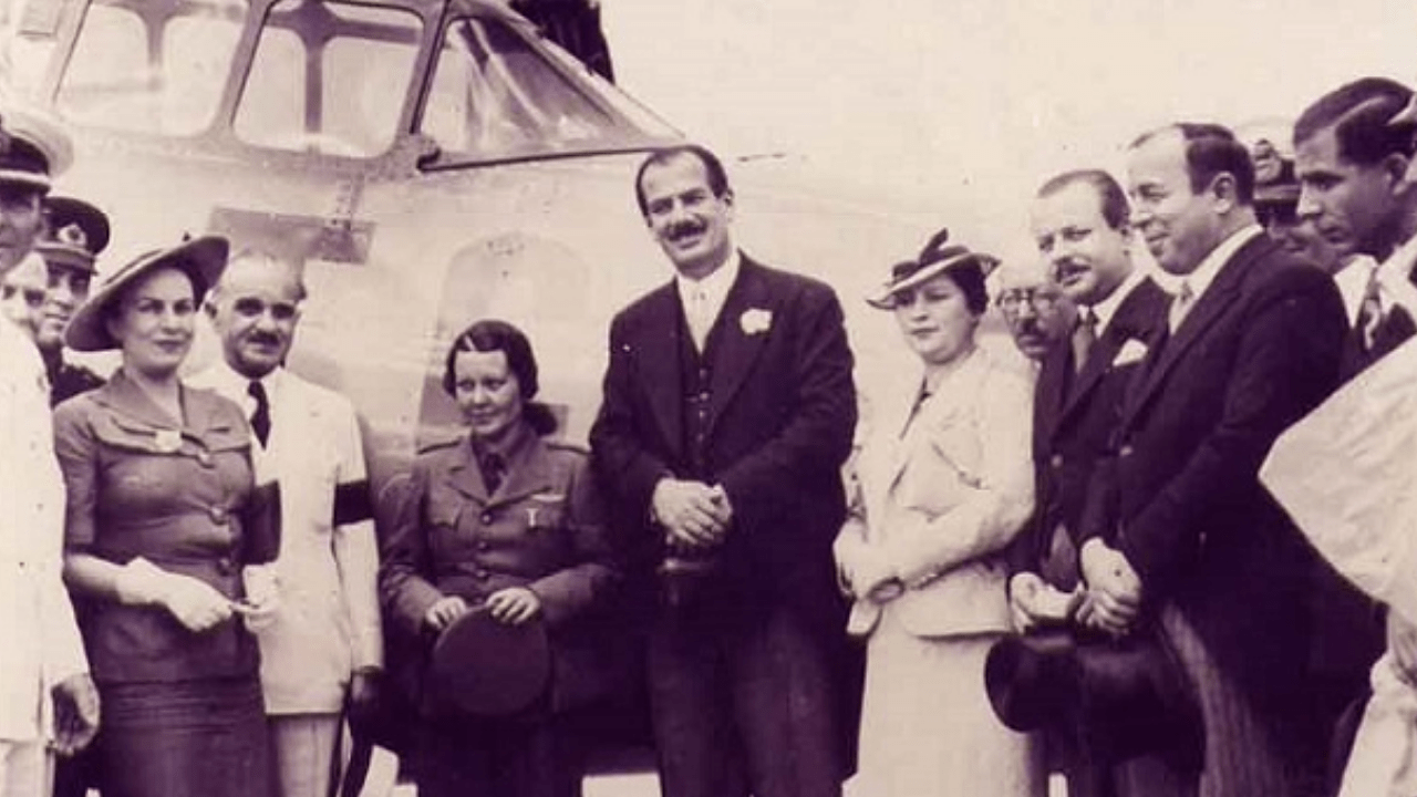 With Sabiha Gökçen and ambassador Ruşen Eşref Ünaydın in Athens