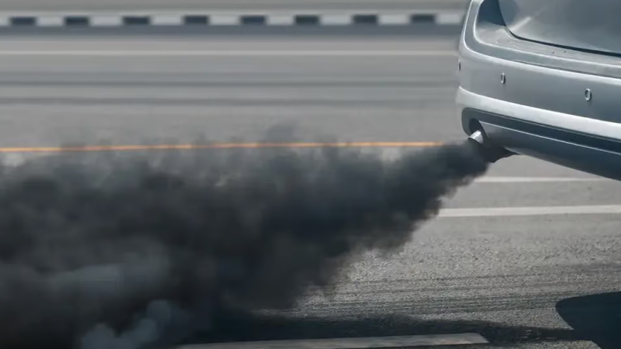 What should I do if black smoke comes out of the exhaust?